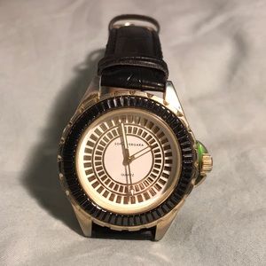 Sofia Vergara black and gold watch